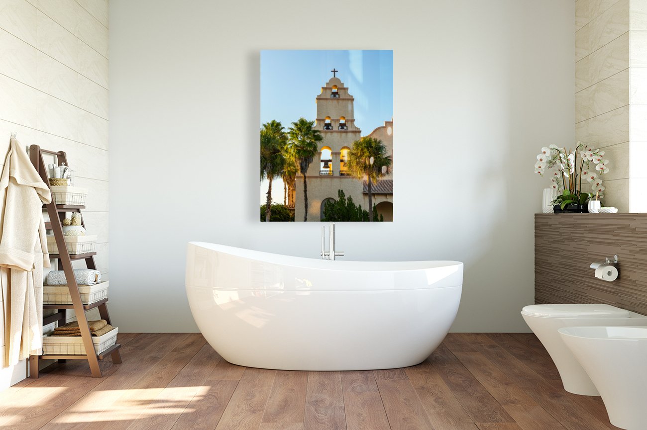 Spanish mission style church tower at sunset Reproduction