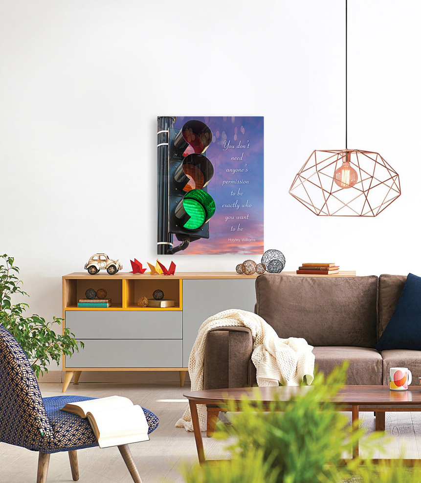 Green light on traffic signal against sunrise as concept Reproduction