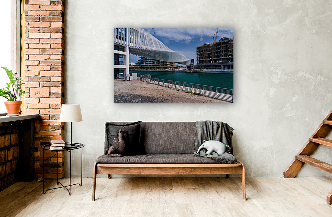 Dubai Water Canal bridge twists towards new apartment blocks Reproduction