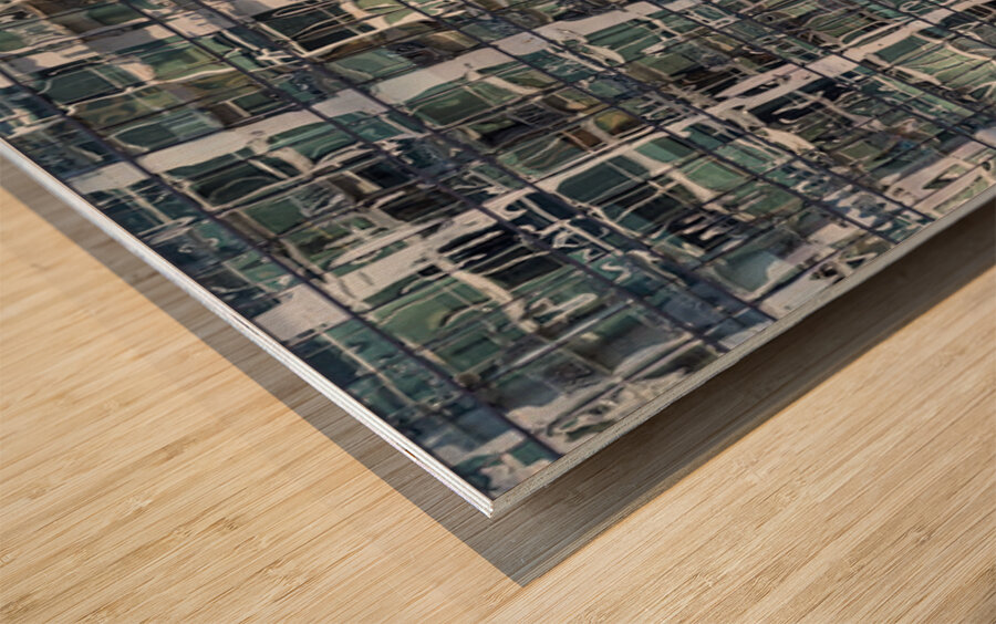 Reflections of condominium tower in windows of apartment buildin Wood print