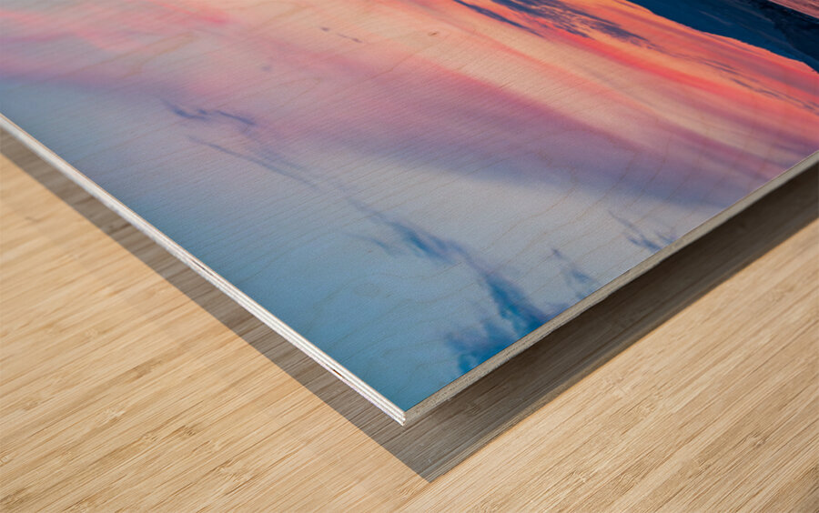 Sunset over Lake Chelan with silhouette of couple paddling on pa Wood print