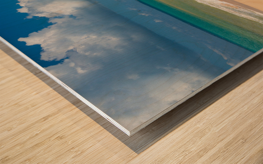 Reclining chairs and umbrella on Baie Rouge Wood print